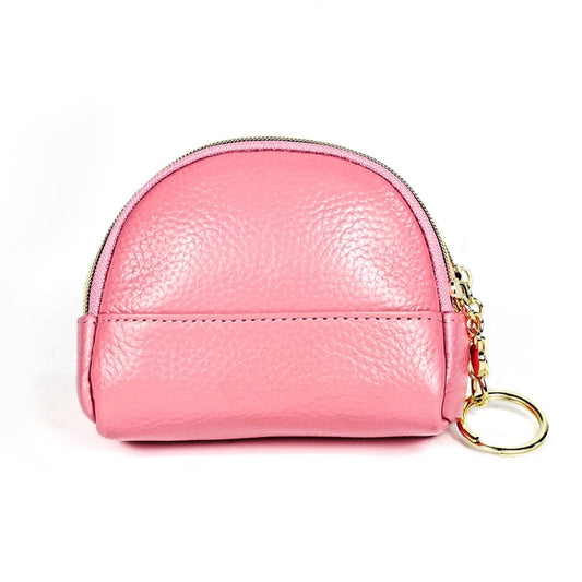Pink leather mini zipper wallet purse with gold zipper pull and front emblem.