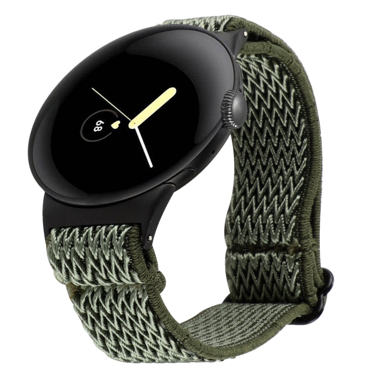 Wave braided nylon watch band in dark olive green, with metal clasp and zigzag knit texture.