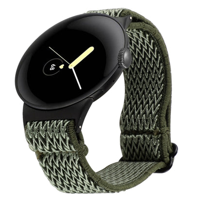 Wave braided nylon watch band in dark olive green, with metal clasp and zigzag knit texture.
