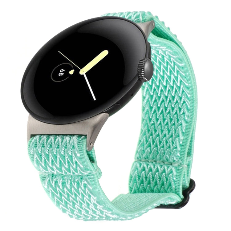 Wave braided nylon watch band in mint teal, with metal clasp and zigzag knit texture.