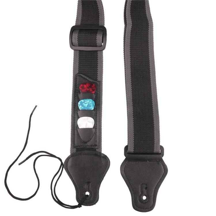 Black guitar strap with three pick inlays and adjustable woven shoulder strap