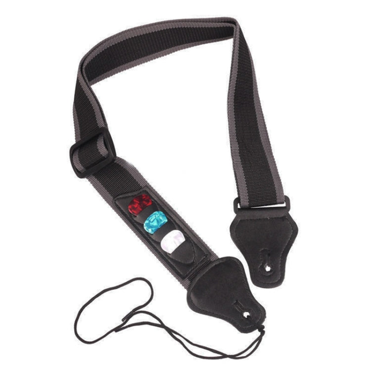 Black guitar strap with three pick slots and two leather strap ends with holes