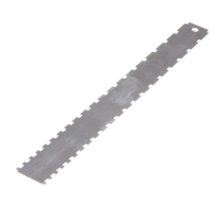 Steel guitar neck measuring ruler strip with evenly spaced scale markings