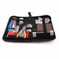 Guitar repair tool set opened in black pouch with multicolor-handled tools