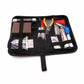 Guitar repair tool set laid out flat in black roll-up case, assorted gauges and tools