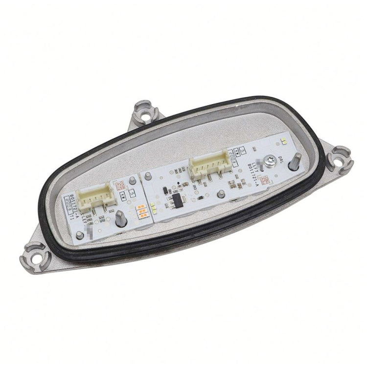 Left LED turn signal ballast control module, long front view with visible circuit parts