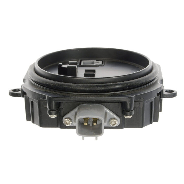 HID ballast module front view with metal terminals and gray wiring connector