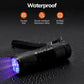 Black UV flashlight with textured grip and lanyard, waterproof design