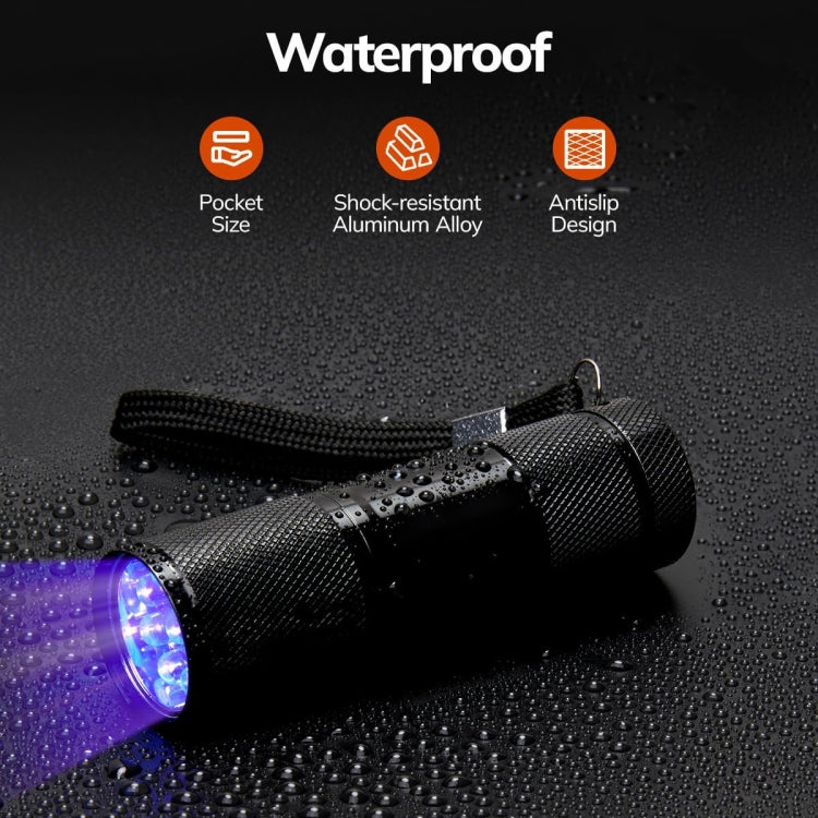Black UV flashlight with textured grip and lanyard, waterproof design