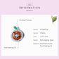 Sterling silver grapefruit charm with orange enamel and green leaf detail