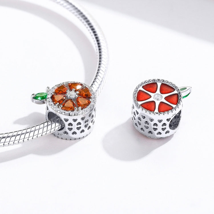 Sterling silver fruit charm set: orange grapefruit charm and red pomegranate-style charm
