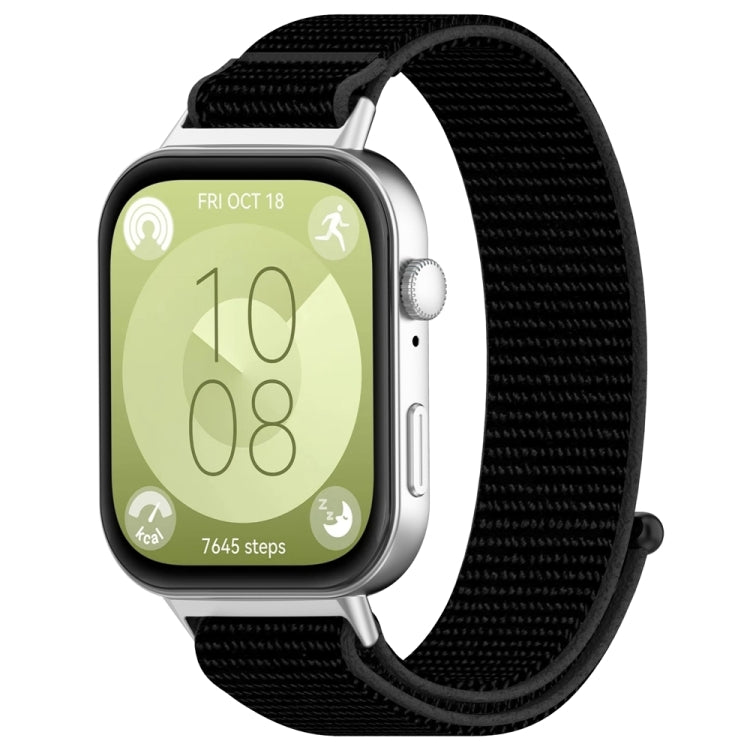 Black nylon hook-and-loop watch band with matching dark edging, attached to a smartwatch
