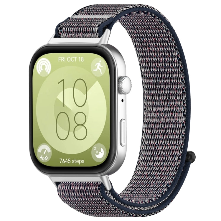 Multicolor nylon hook-and-loop watch band with navy edging, attached to a smartwatch