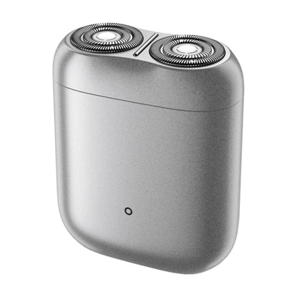 Silver electric rotary shaver with two round foil cutting heads and power button
