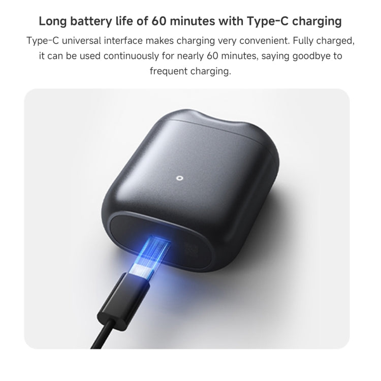 Black electric shaver with Type-C charging cable connected and blue charging light
