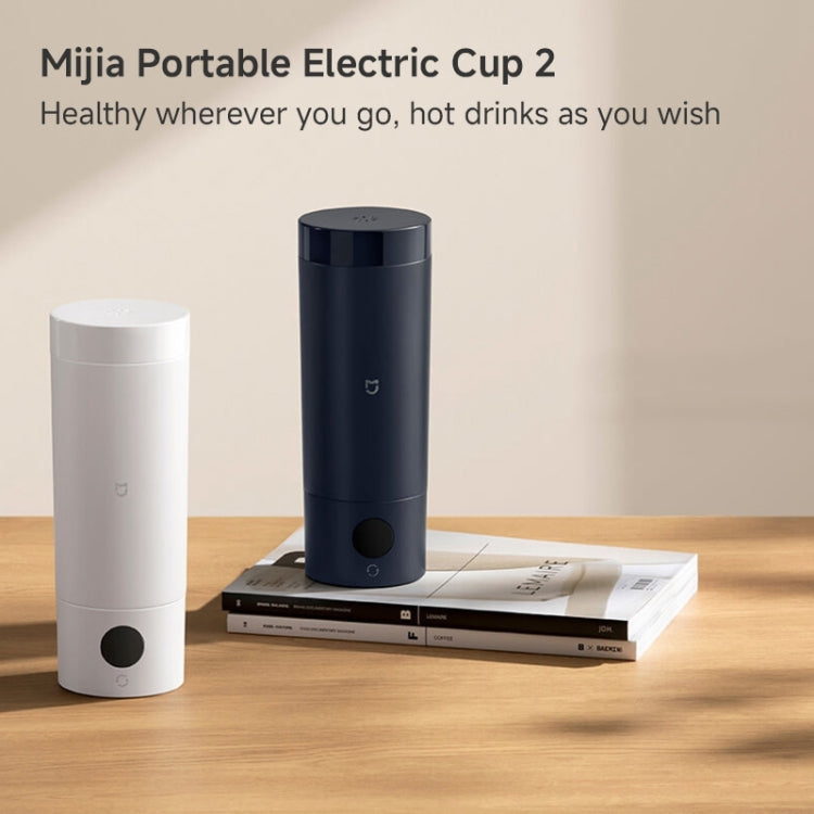 Portable electric heating cup with dark lid and LED temperature display