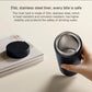 Handheld portable electric heating cup showing stainless inner liner through cutaway