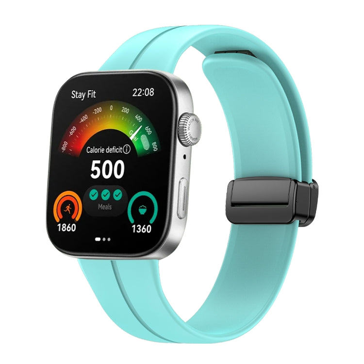 Teal silicone watch band with black magnetic buckle shown on a smartwatch