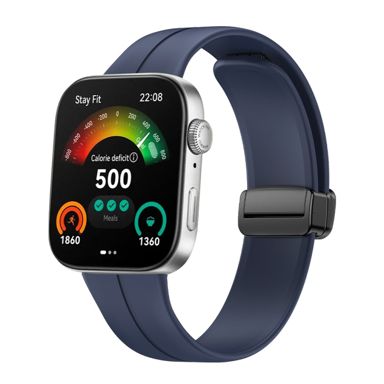 Dark blue silicone watch band with black folding buckle, shown attached to a smartwatch