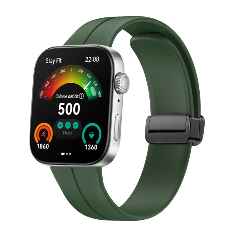 Dark green silicone watch band with black folding buckle, shown attached to a smartwatch