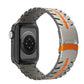 Titanium steel watch band with orange accents and double-lock clasp, shown on a watch