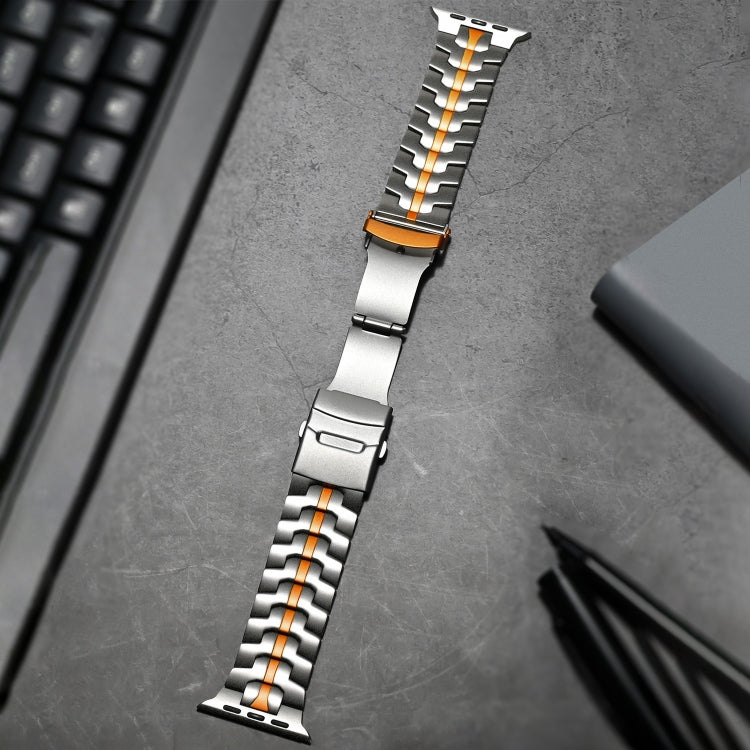 Titanium steel watch band with orange accents and a double-lock clasp, shown unfolded