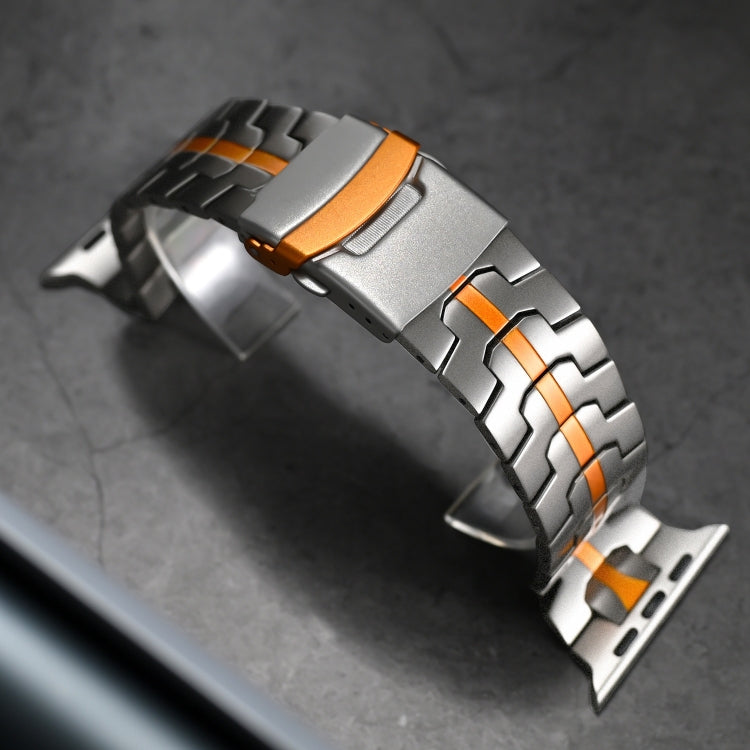 Titanium steel watch band with silver links, orange accents, and a double-lock buckle