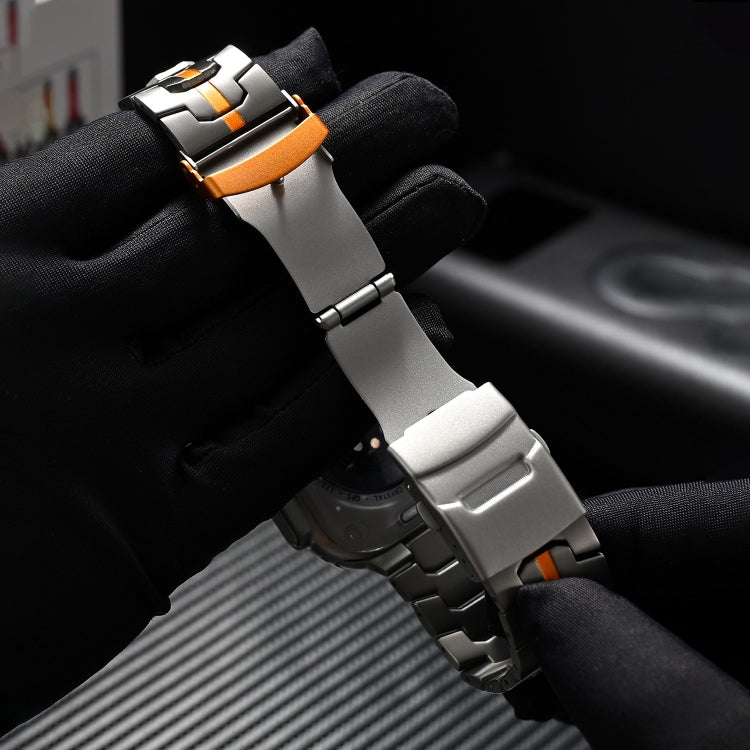 Titanium steel watch band with an open double-lock clasp and orange link accents
