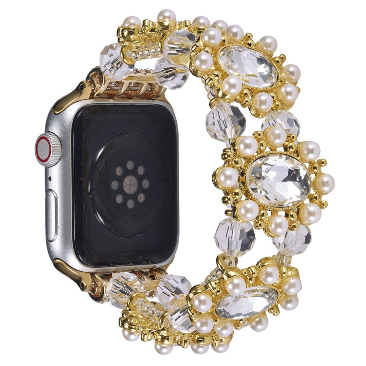 Gold-tone Apple Watch band with pearl beads and clear faceted crystals
