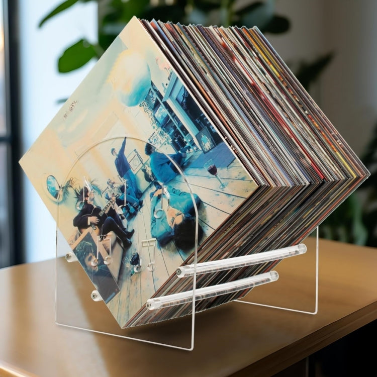 Acrylic vinyl record display stand holding stacked records with clear side supports