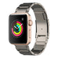 Metal link watch band in a light silver finish, fitted to a smartwatch.