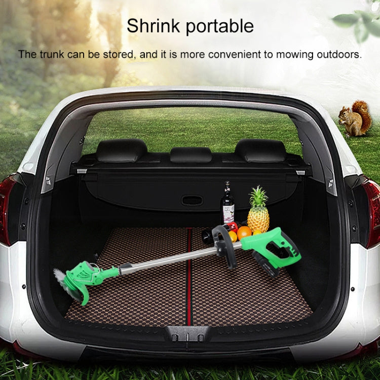 Green portable electric lawn mower weeder stored in a car trunk