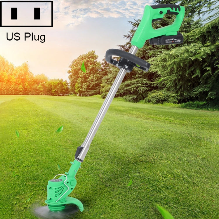 Green US plug rechargeable lawn mower weeder with long shaft, cutting along greenery