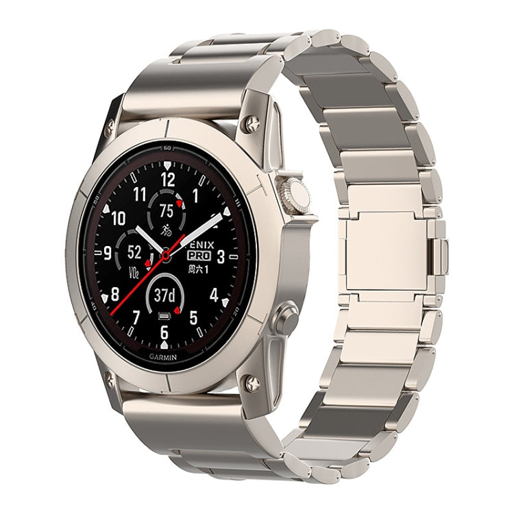 Titanium-tone metal quick-release watch band shown on a Garmin watch.