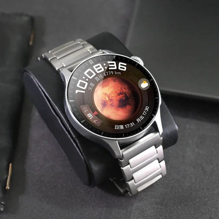 Silver titanium alloy watch band fitted to a smartwatch, viewed at an angle.