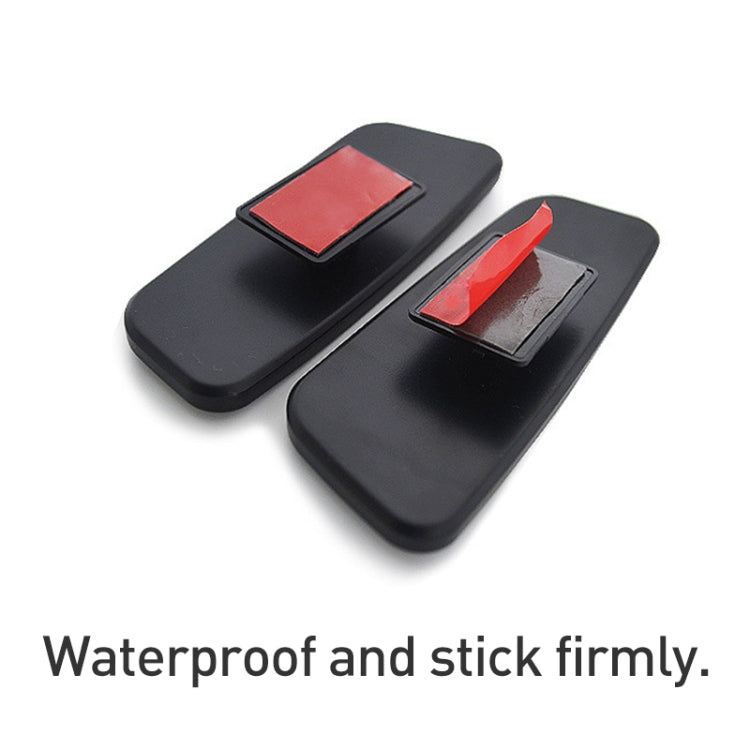 Auxiliary mirror bases with red adhesive pads on black covers