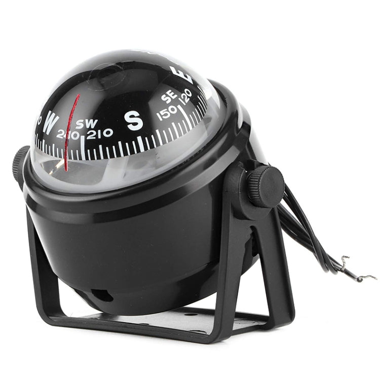 Black boat compass with illuminated dial and mounting base, side view