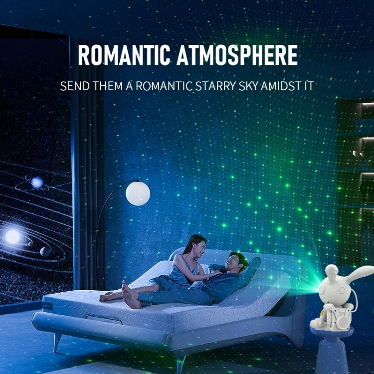 White space rabbit projection lamp projecting starry dots and nebula colors in a bedroom