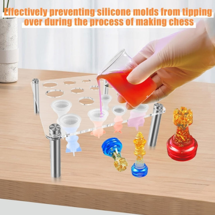 Clear acrylic chess mold stand with four legs and red pourable mold form