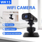 Compact WiFi security camera on a small tabletop stand, front lens visible
