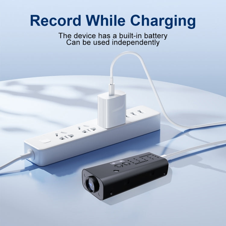 WiFi security camera charging with a white adapter cable and power dock