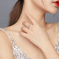 Sterling silver wavy curve ring on finger, close-up on hand