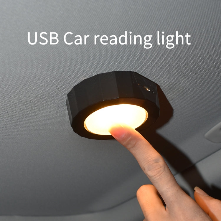 USB car LED reading light, black housing with lit warm circular LED panel
