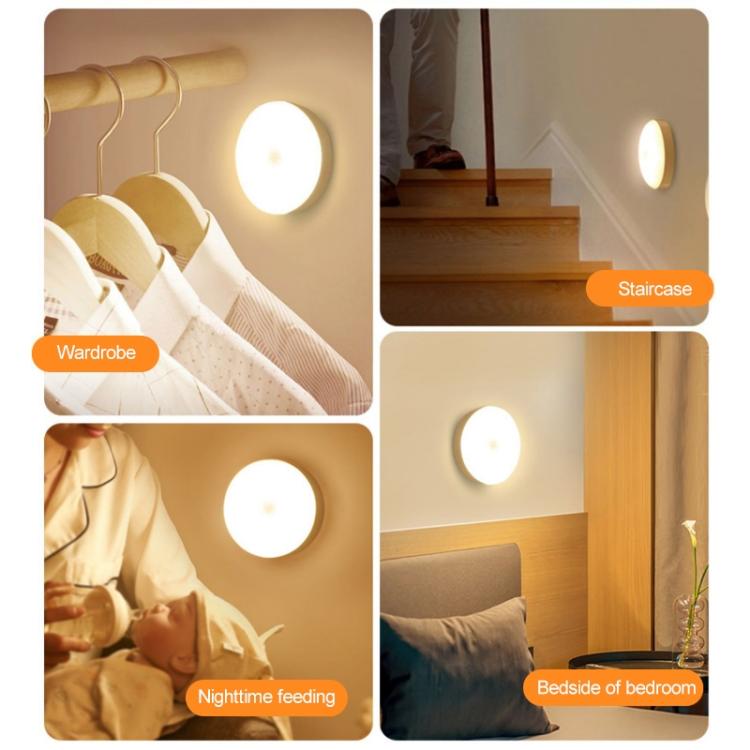 Round LED night light in use on wardrobe and staircase, warm glow