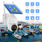 Outdoor solar security camera with dome housing, black lens cluster, and roof-style panel