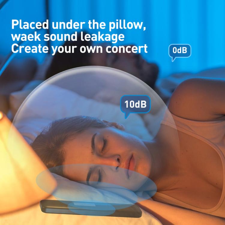 Black sleep speaker near pillow with illuminated ring sound effect