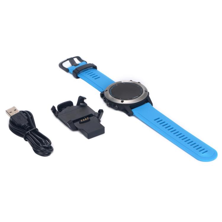 Blue Garmin smartwatch shown with black charging base and USB cable
