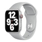 Light gray silicone watch band with a round metal stud closure, fitted to a watch