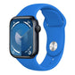 Bright blue silicone Apple Watch band with pin-and-tuck closure, shown on a watch.