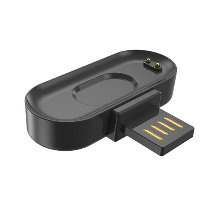 xDfind magnetic watch charger viewed from the opposite side, showing its USB plug